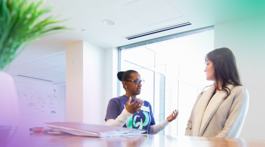 PRI vs. SIP: Two women talking around a table